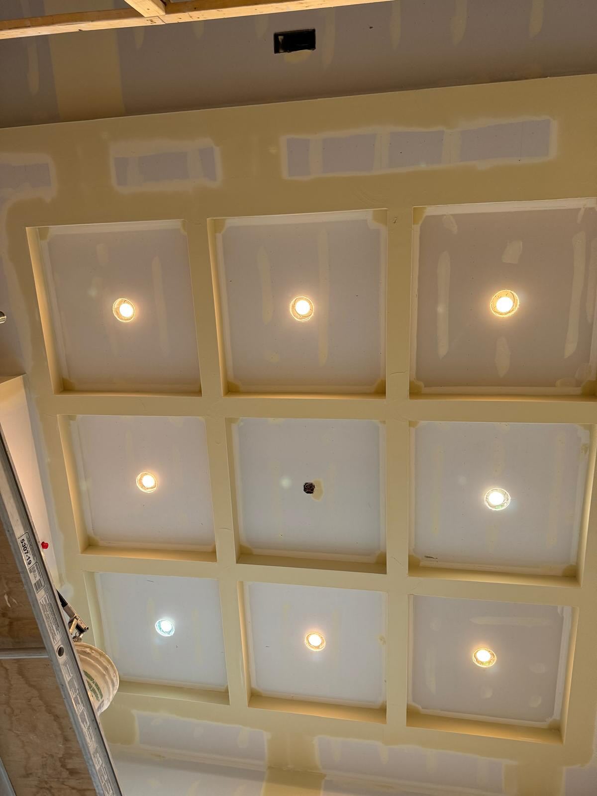 Coffered ceiling drywall installation in progress