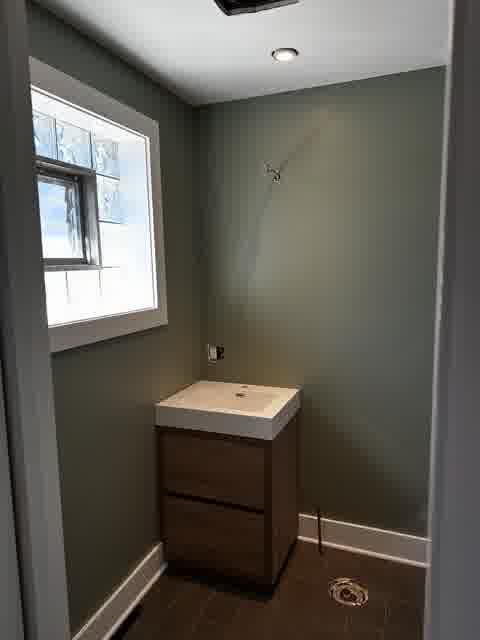Finished bathroom with smooth walls